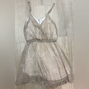 Sleeveless Beige Printed Ruffle-Hem Casual Dress